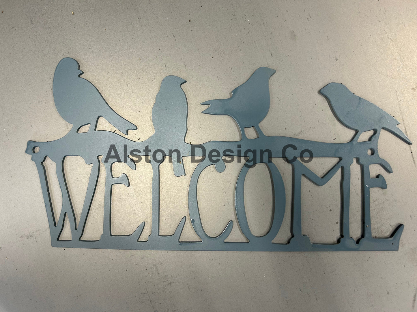 Hanging welcome sign