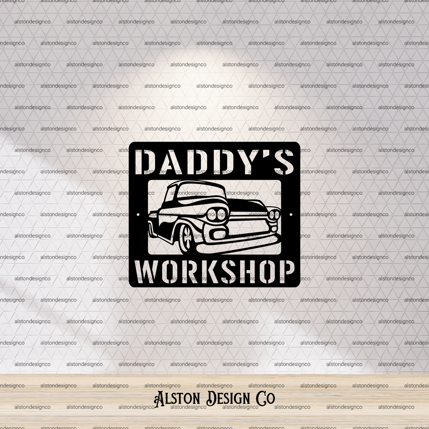 Decorative sign with 'Daddy's Workshop' text and car illustration on a branded background.