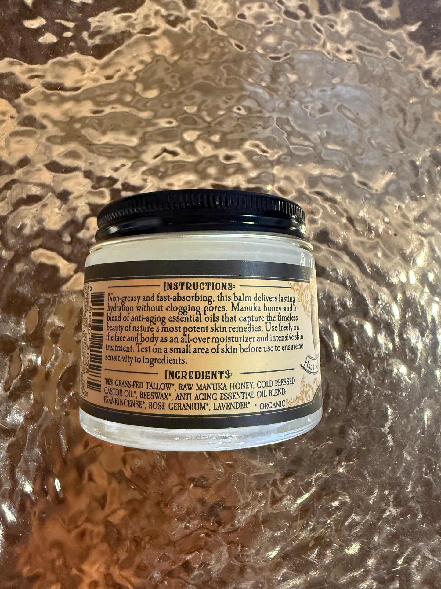 Jar with a label on a textured surface